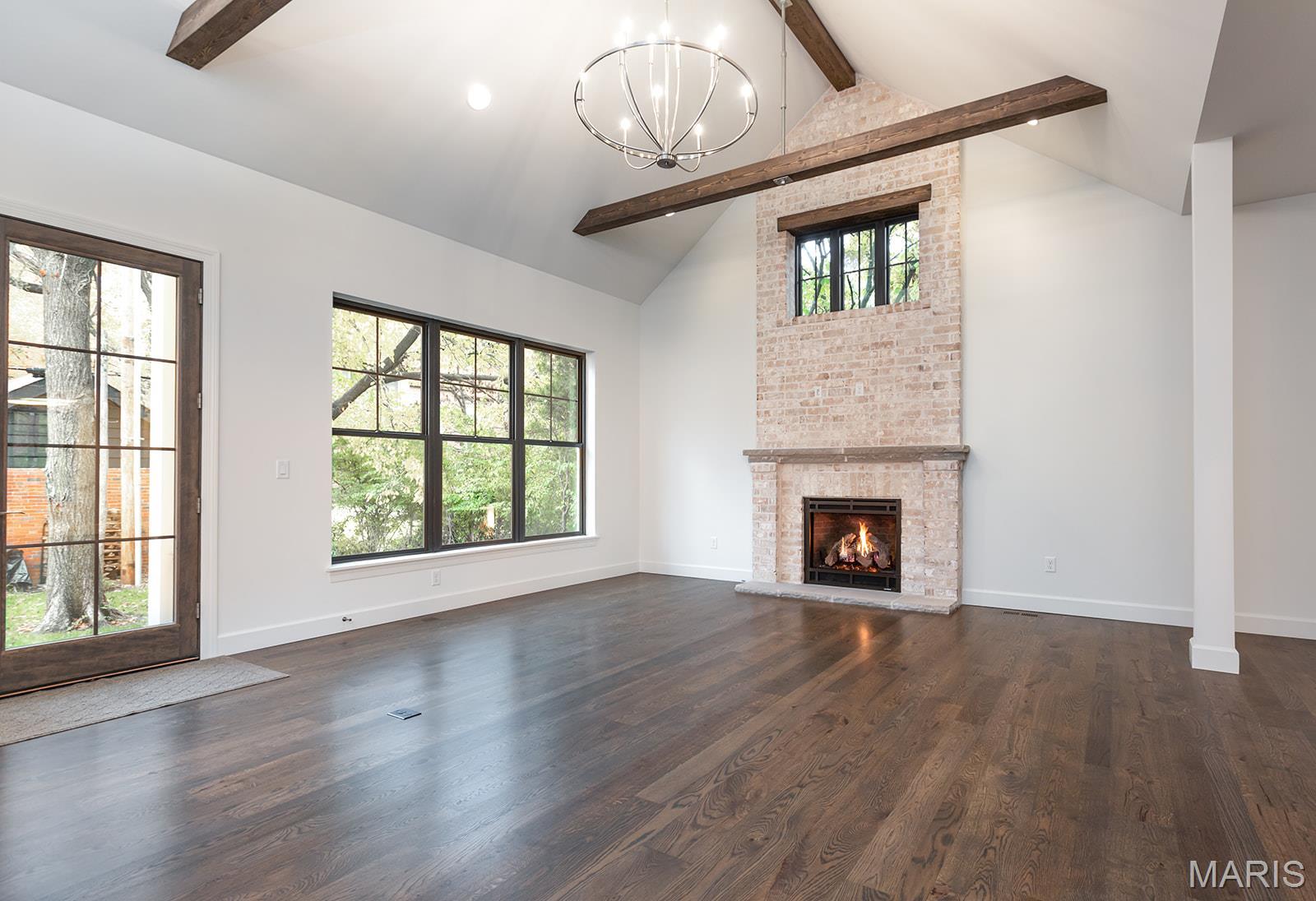 Living room with brick fireplace